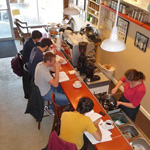 Customers working at the coffee bar